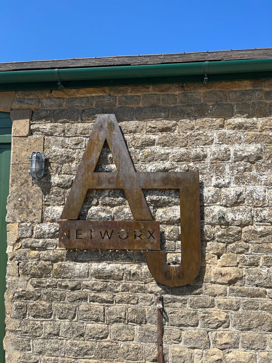 Business Weathered Steel Signs